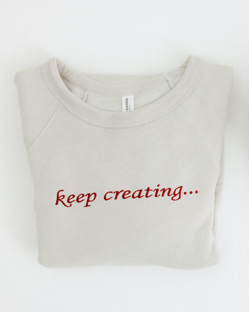 Embroidered "Keep Creating" Unisex Sweatshirt in Beige