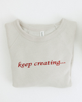 Embroidered "Keep Creating" Unisex Sweatshirt in Beige